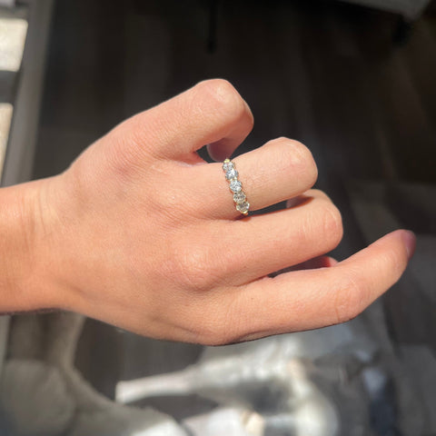 Elegant .86ctw Old European Cut Diamond 5-Stone Band, romantic design with Old European Cut Diamonds, Earth-mined diamonds in yellow gold shown on ring finger