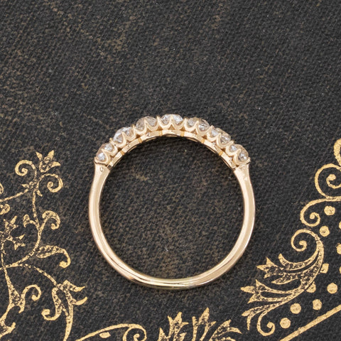 Side view of .86ctw Petite Old Mine Cut Diamond 7-Stone Band, vintage-inspired band with Old Mine Cut Diamonds, crafted in yellow gold