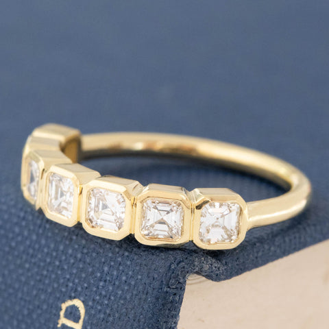 Antique lovers’ .87ctw Asscher Cut Diamond Bezel Half-Hoop Band in yellow gold, featuring rare Earth-mined Antique Diamonds