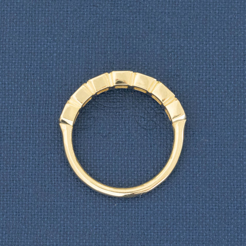 Side view of .87ctw Asscher Cut Diamond Bezel Half-Hoop Band, vintage-inspired band with Antique Diamonds, crafted in yellow gold