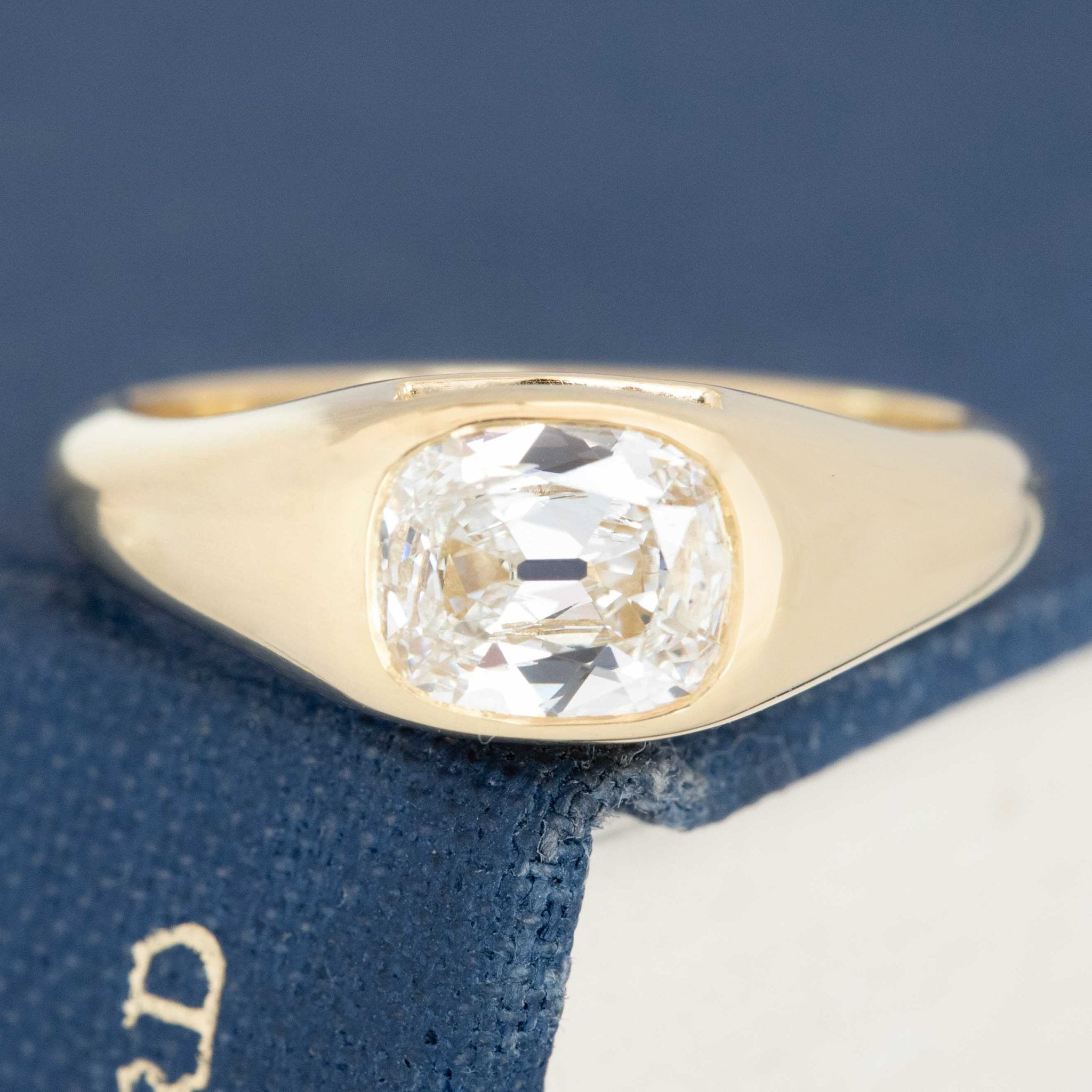 Low-profile antique diamond ring in gold