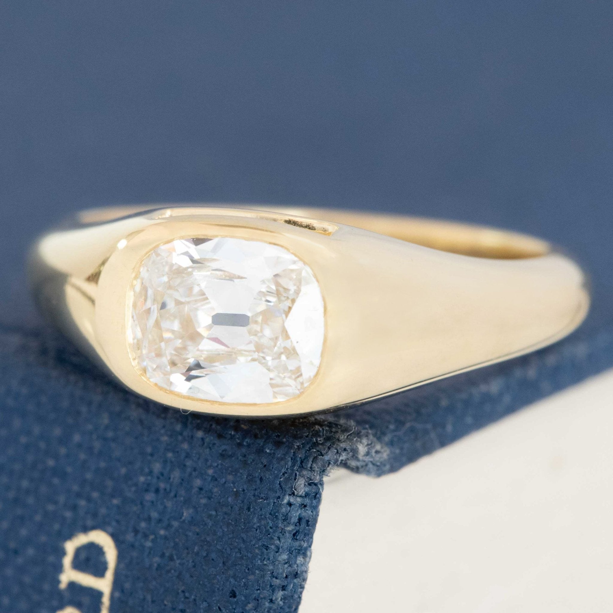Yellow gold bezel ring with old mine cut diamond