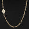 0.90ct kite shaped diamond bezel station necklace in 18kt and 14kt yellow gold