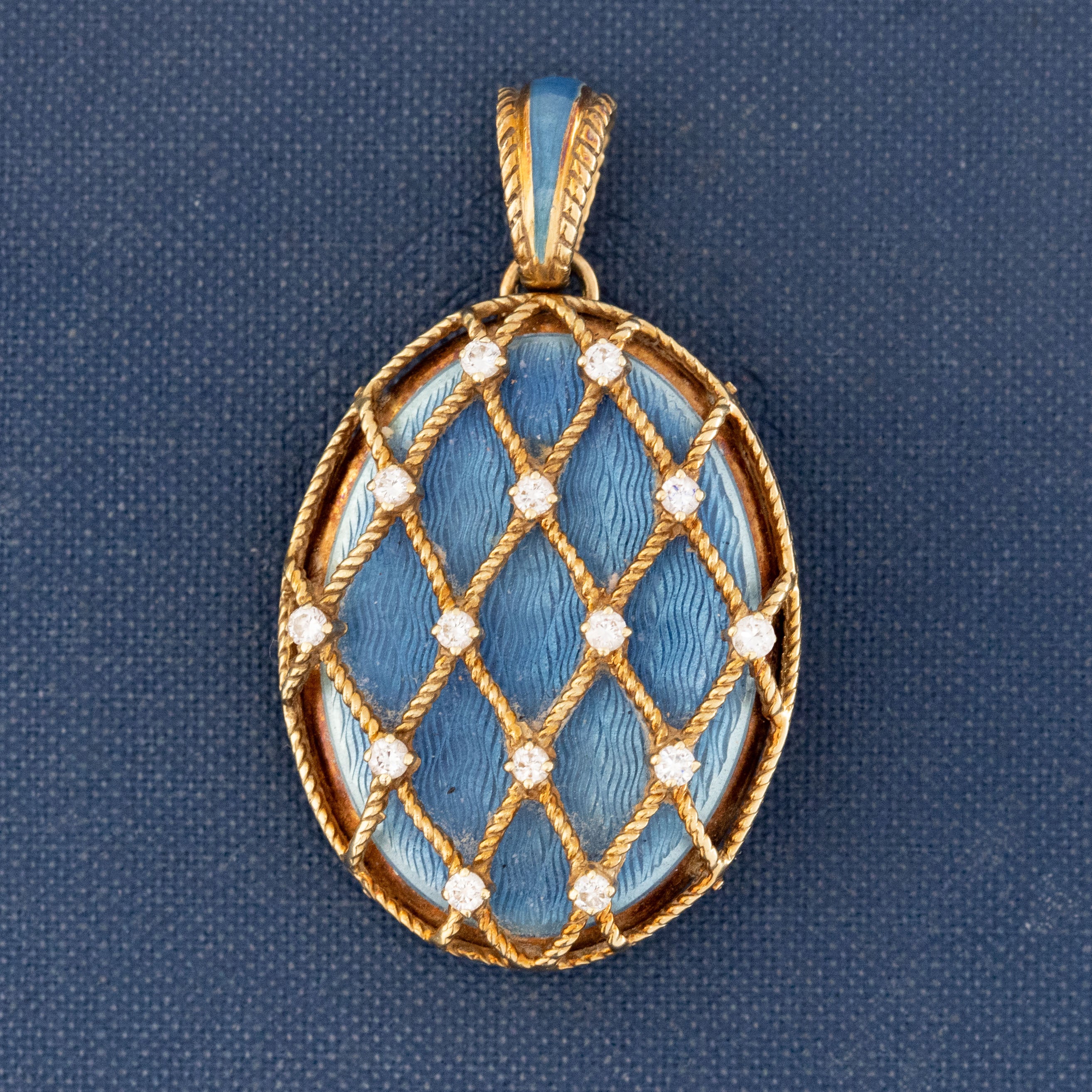Antique blue enamel locket with diamond lattice detail in gold