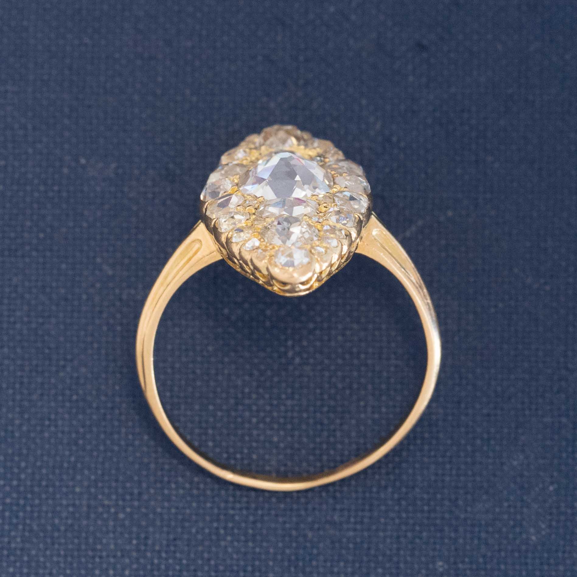 Vintage navette diamond ring with inverted old mine cut center, 18k yellow gold.