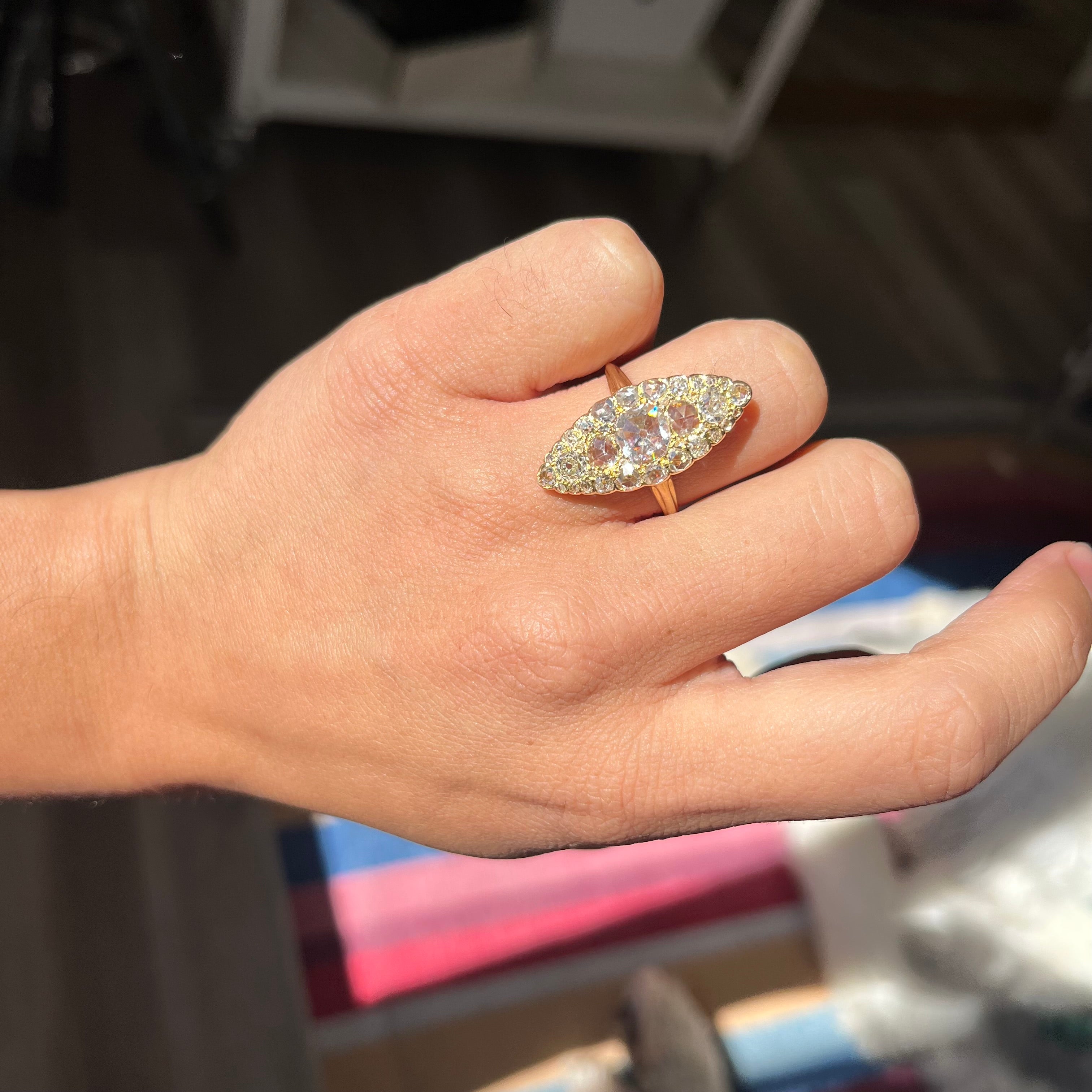 Antique-inspired navette ring in 18k gold, mixed old mine and rose cut diamonds. shown on hand