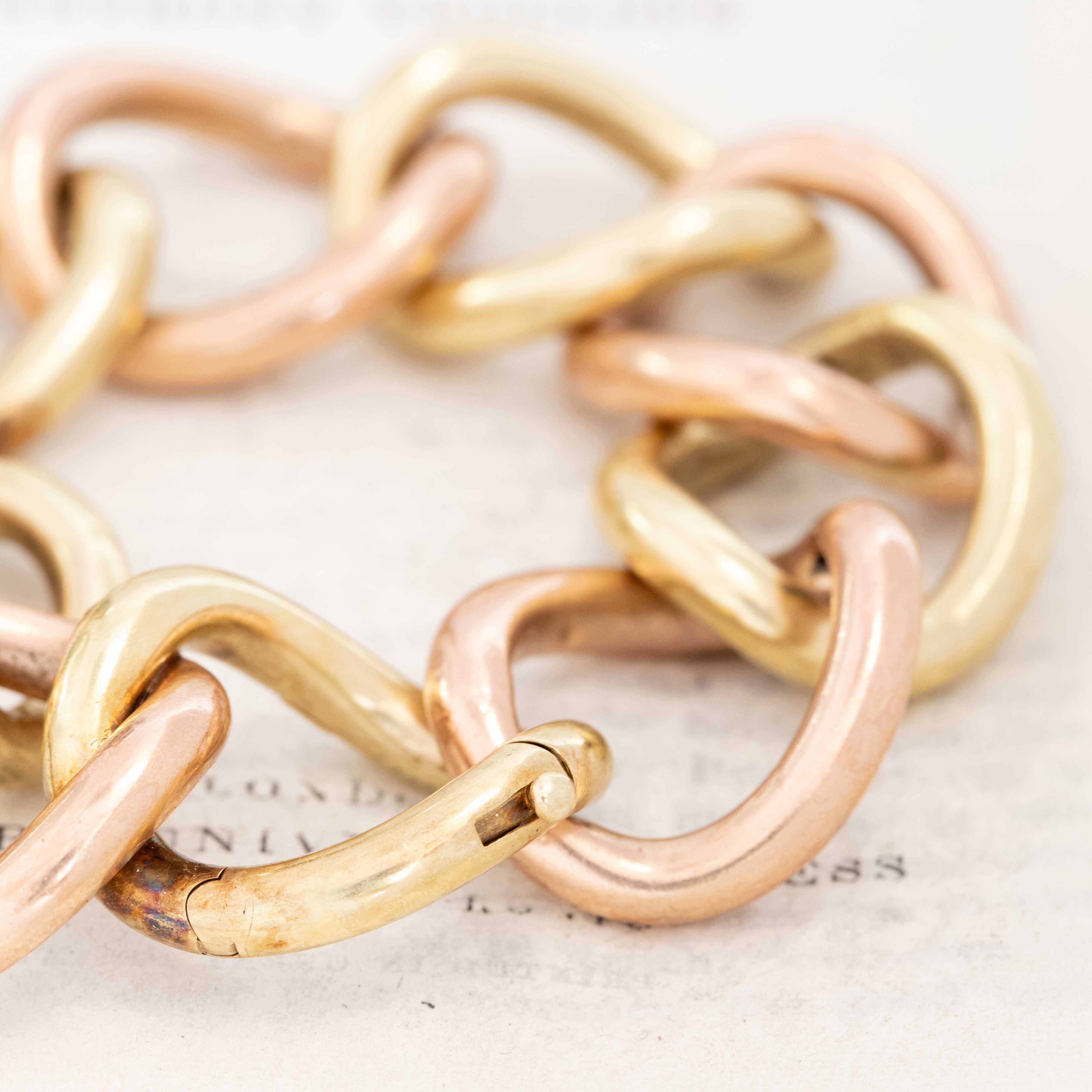 Close-up of XL interlocking green and rose gold bracelet