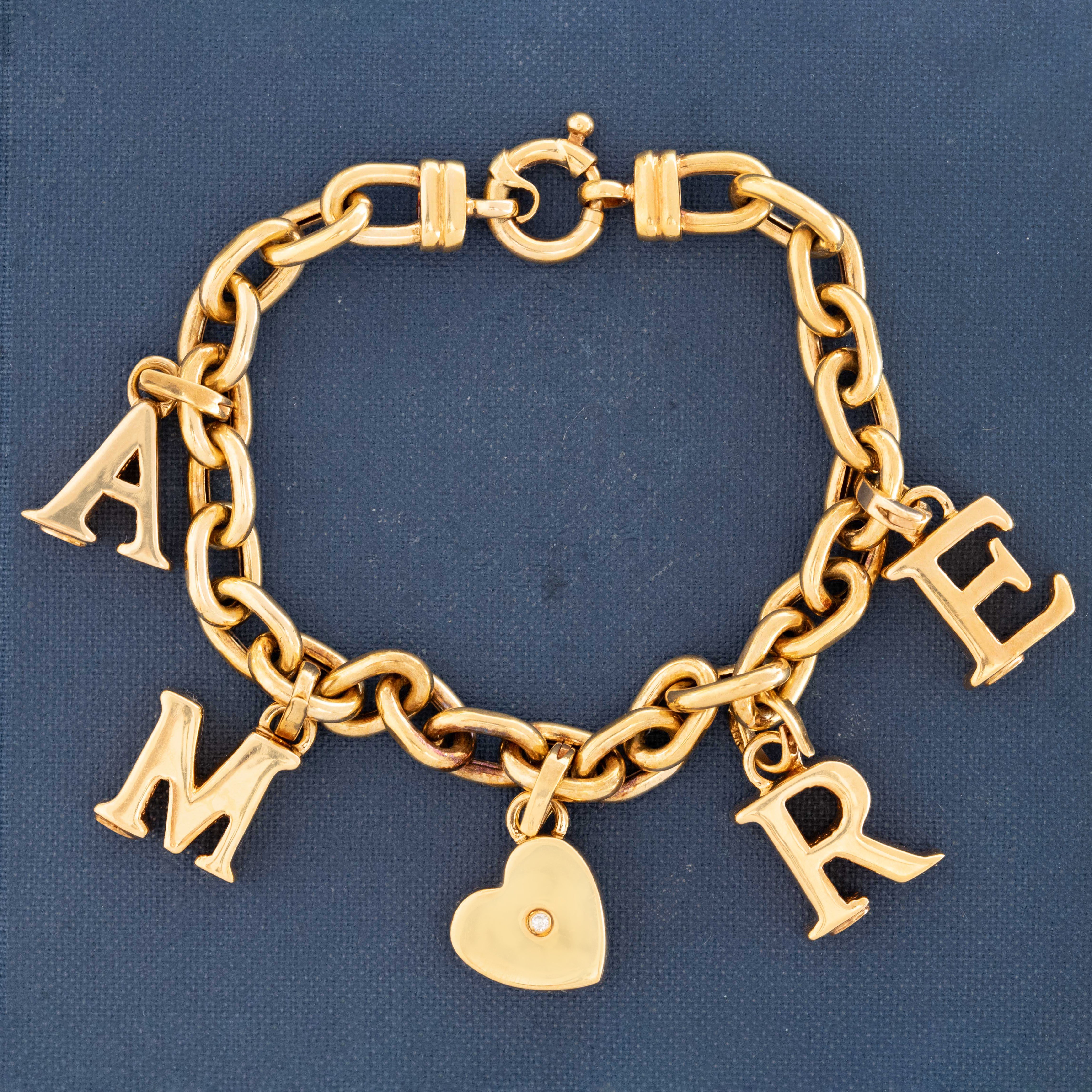 Vintage Italian 18K gold “AMORE” charm bracelet with heart