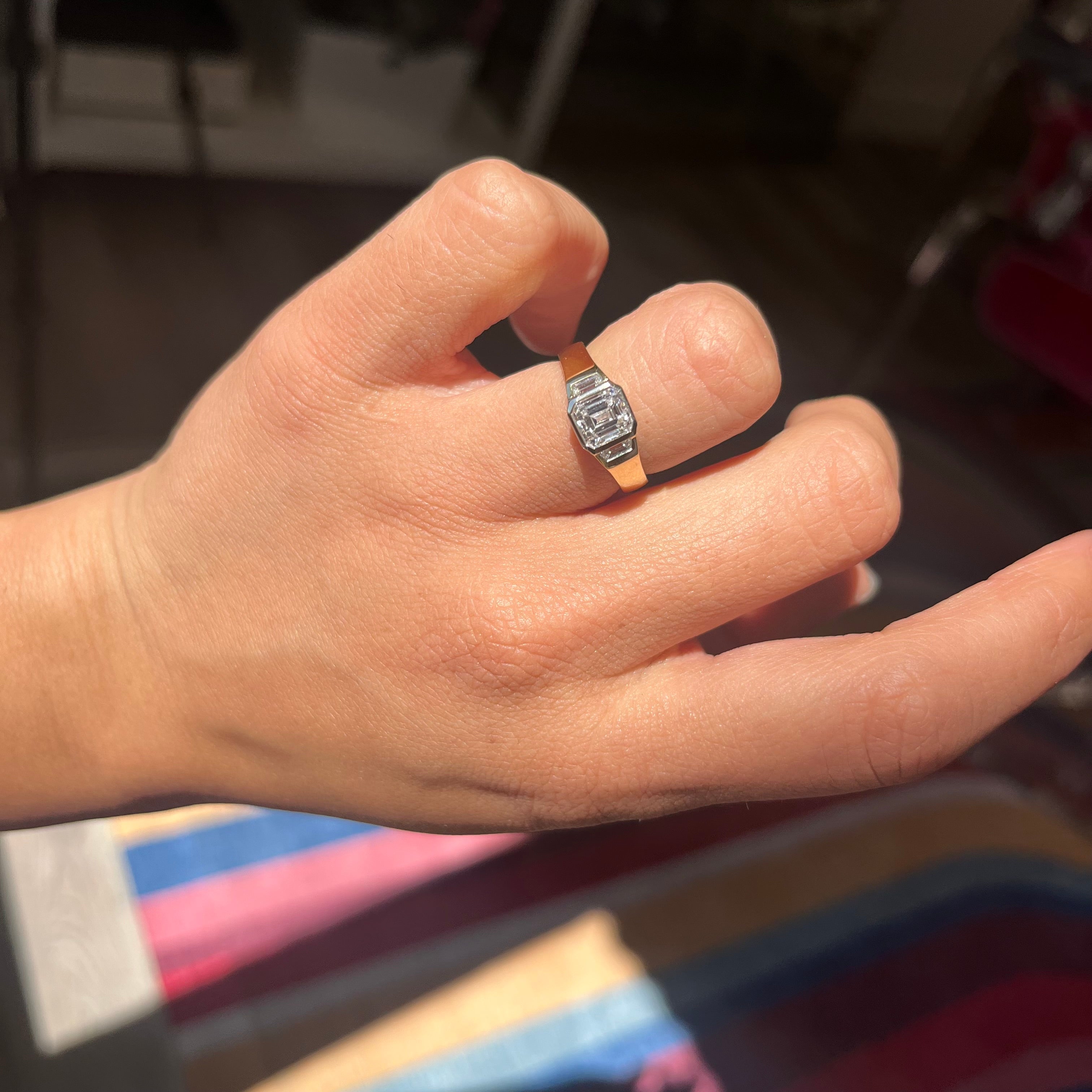 1.31ctw Emerald Cut Diamond Bezel Trilogy Ring
