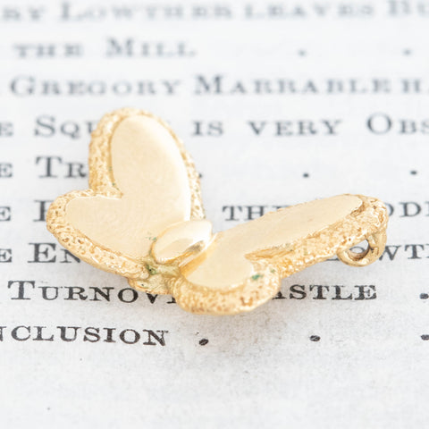 VCA gold butterfly charm with textured wings
