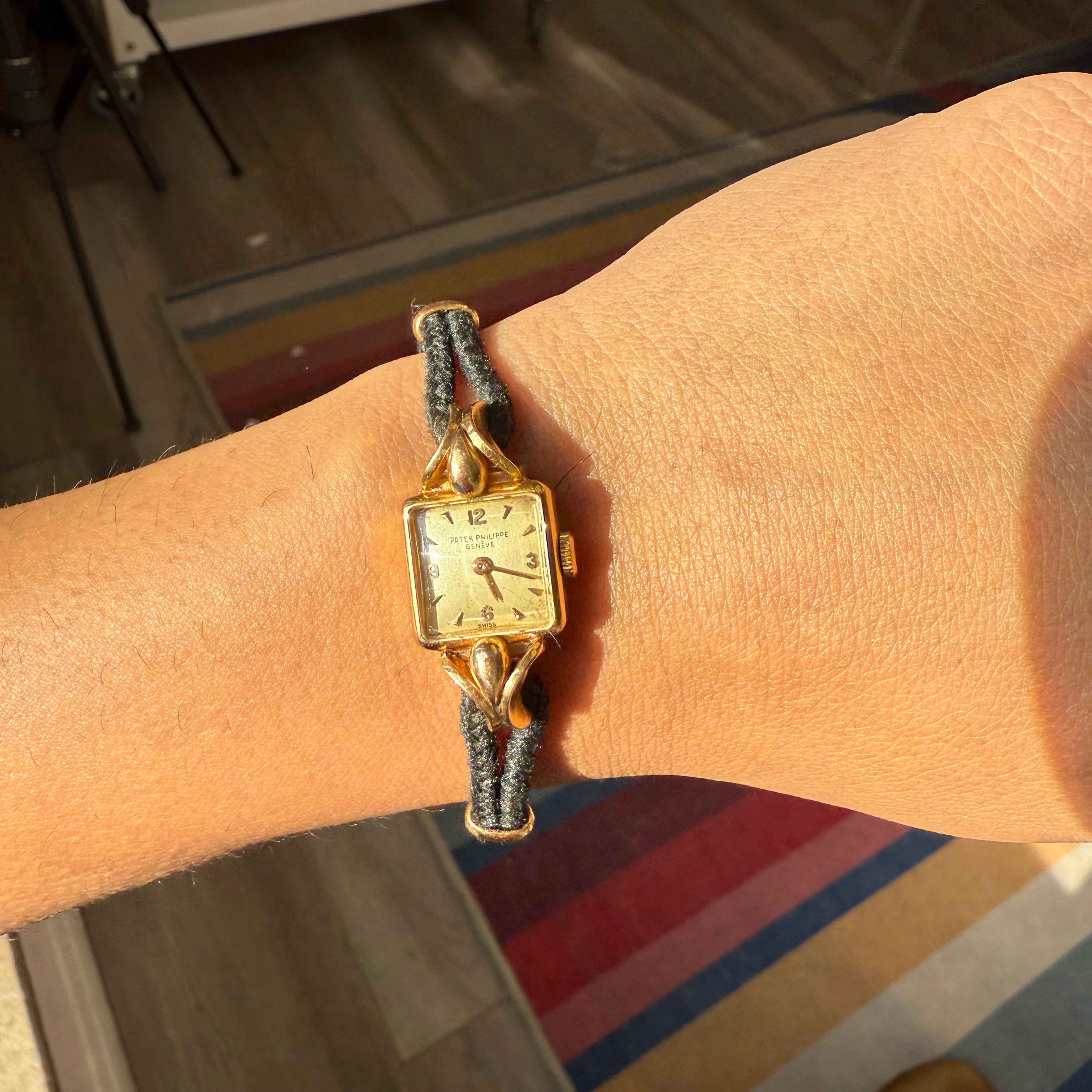 Mid-century Patek Philippe gold watch with cord strap