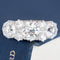 Antique Edwardian five-stone diamond ring with old mine cut diamonds in two-tone gold