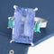 Vintage GIA no-heat color change sapphire three-stone ring with emeralds