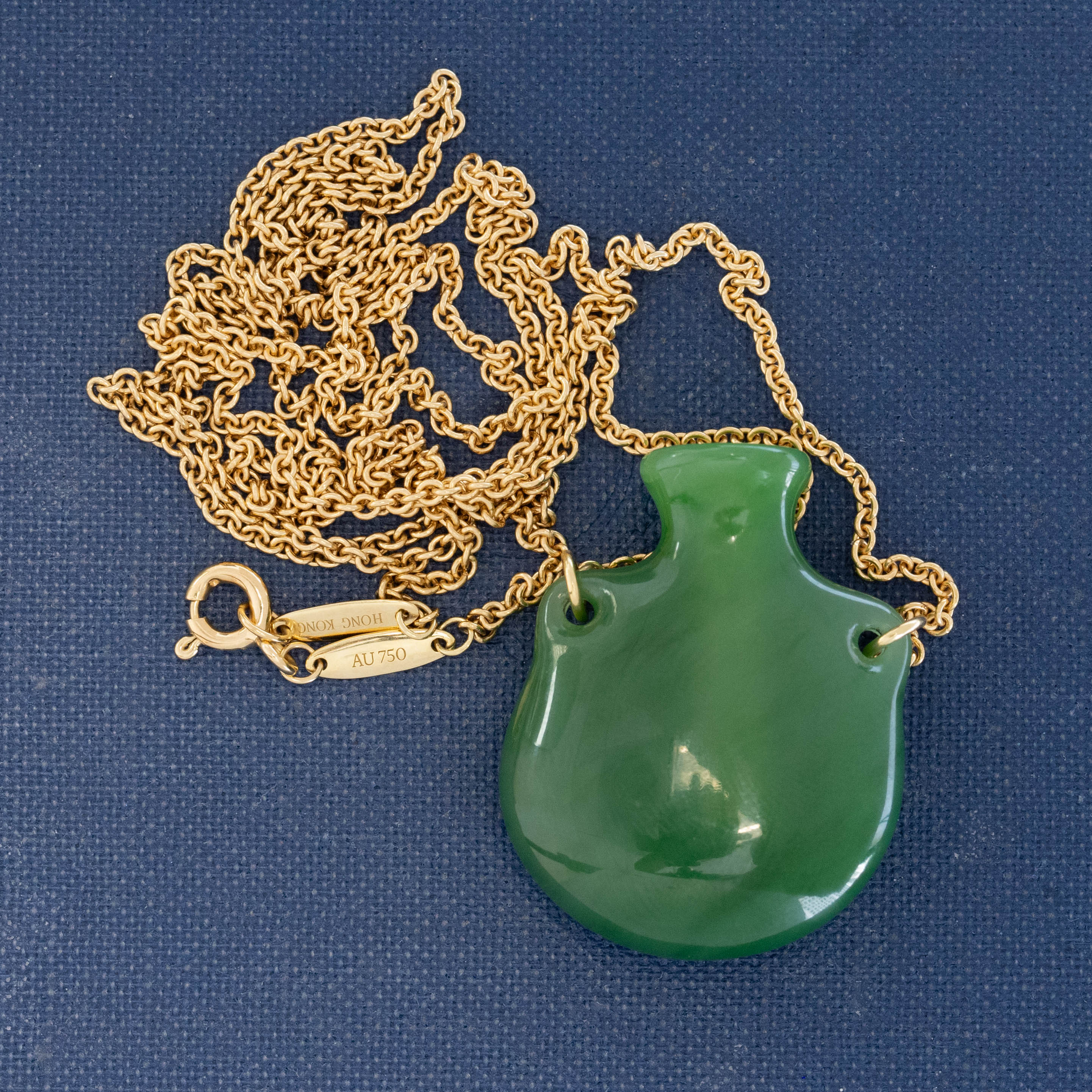 Vintage Tiffany jade pendant with green nephrite stone on gold chain