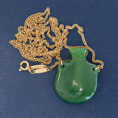 Vintage Tiffany jade pendant with green nephrite stone on gold chain
