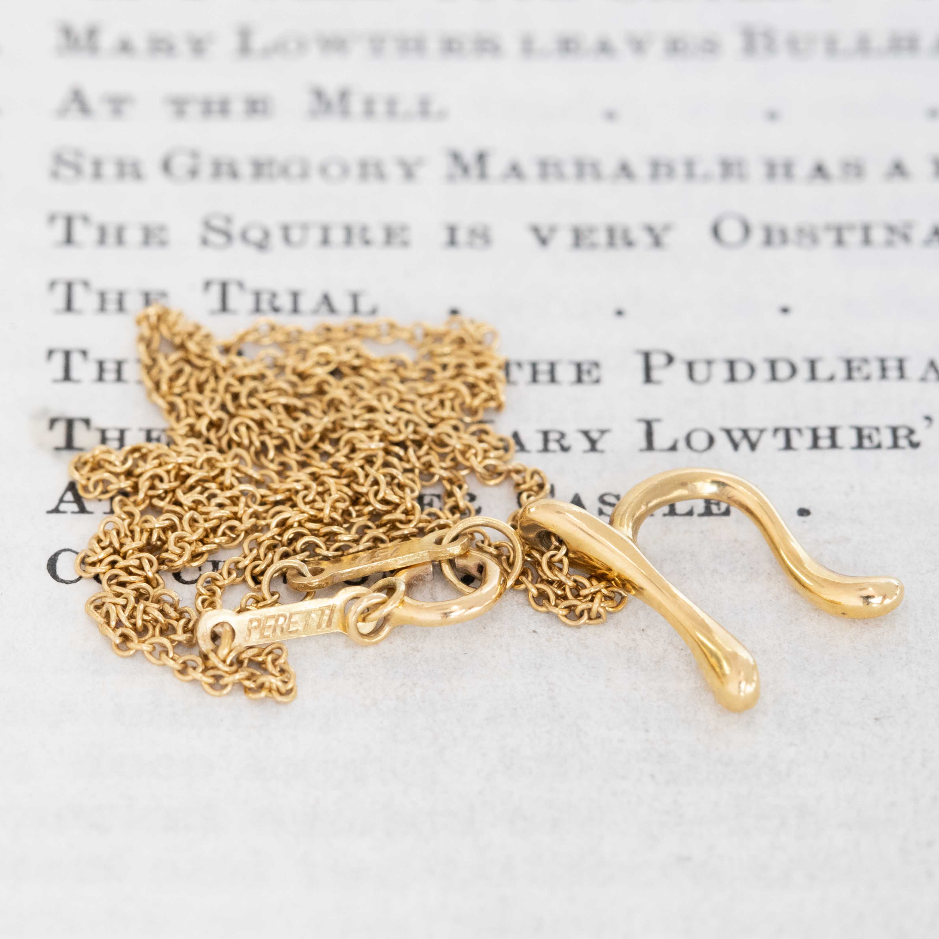 Vintage Elsa Peretti Tiffany initial pendant close-up