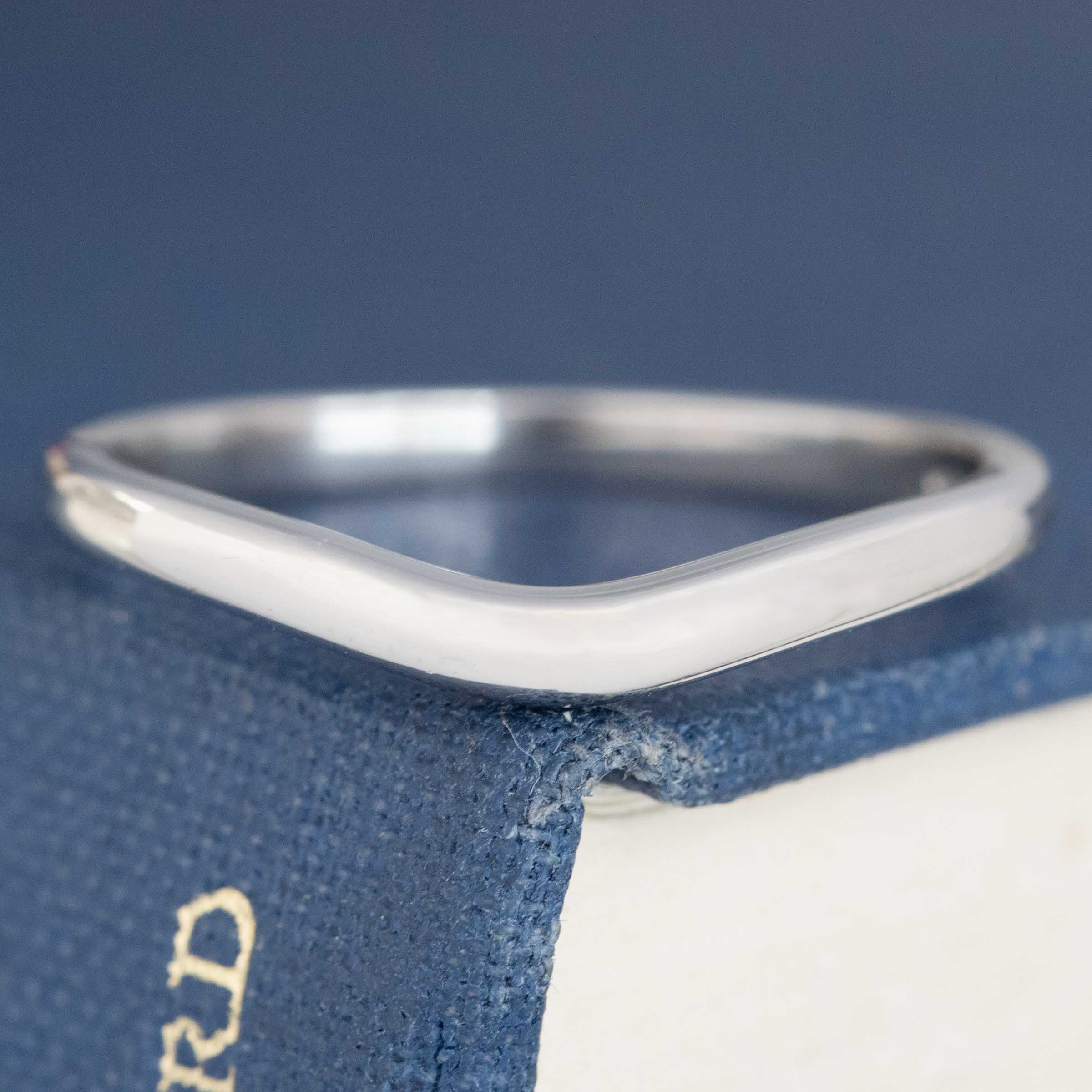 Curved Platinum Band, by Bvlgari