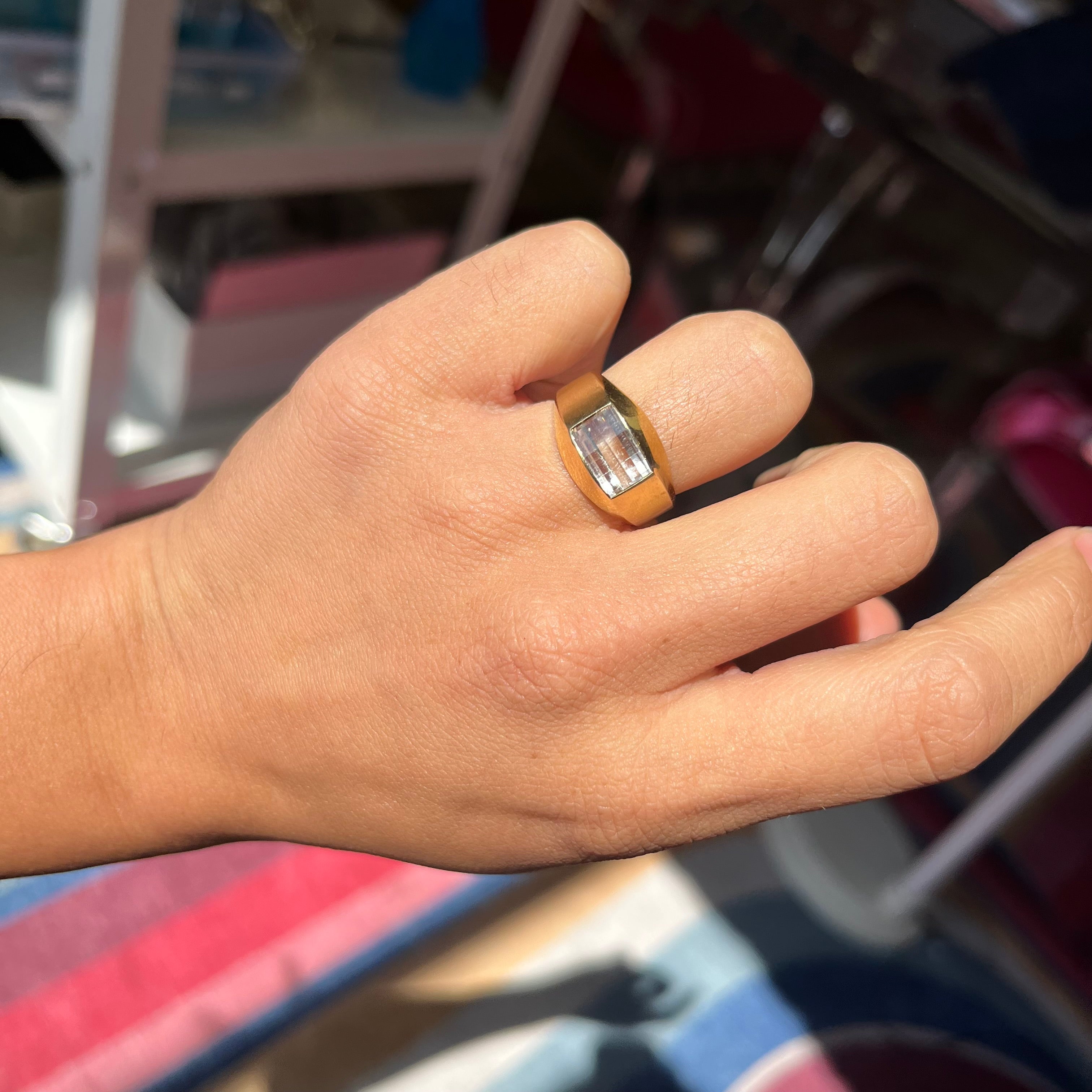 Modern gold ring with East-West white quartz