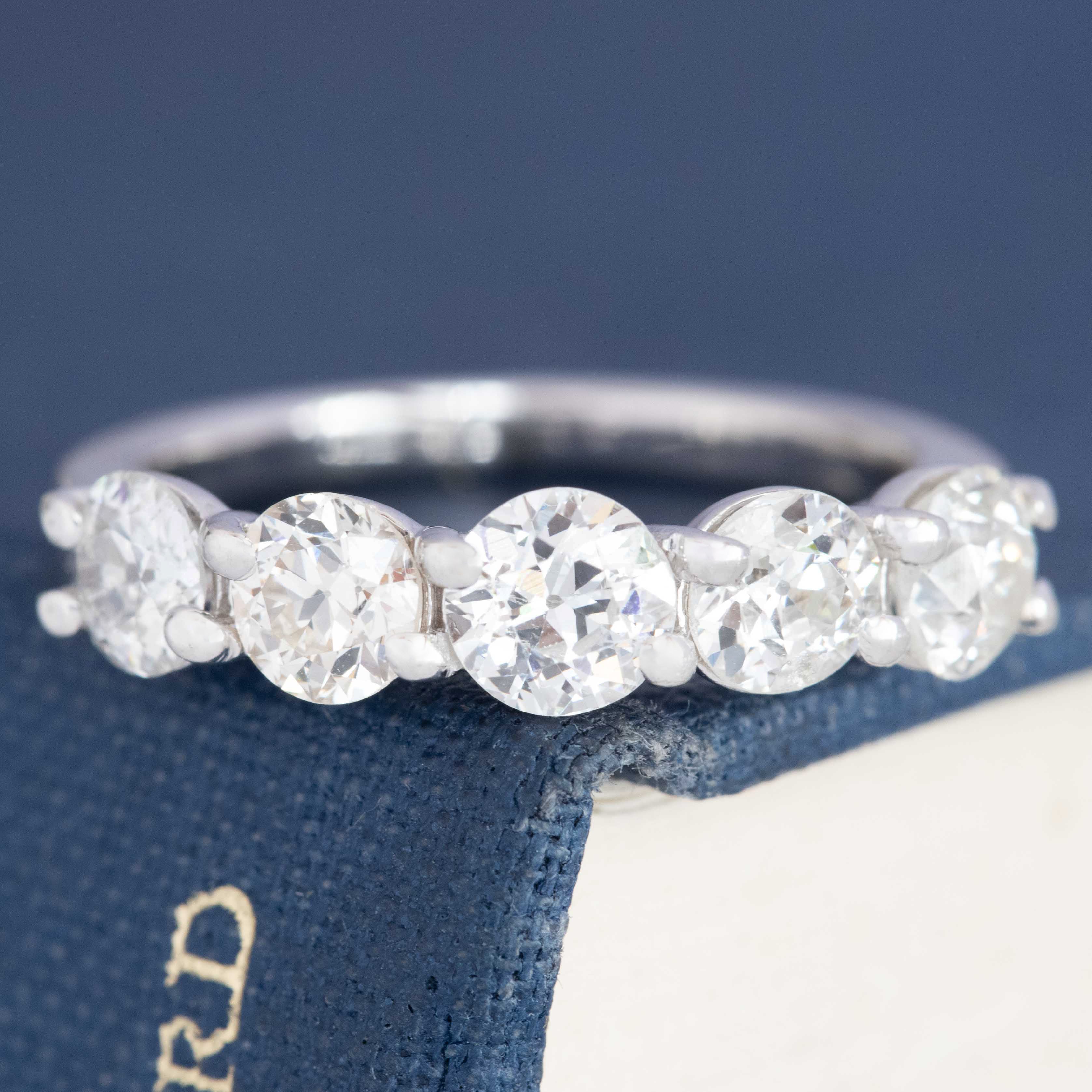 Five stone old European cut diamond band in trellis setting