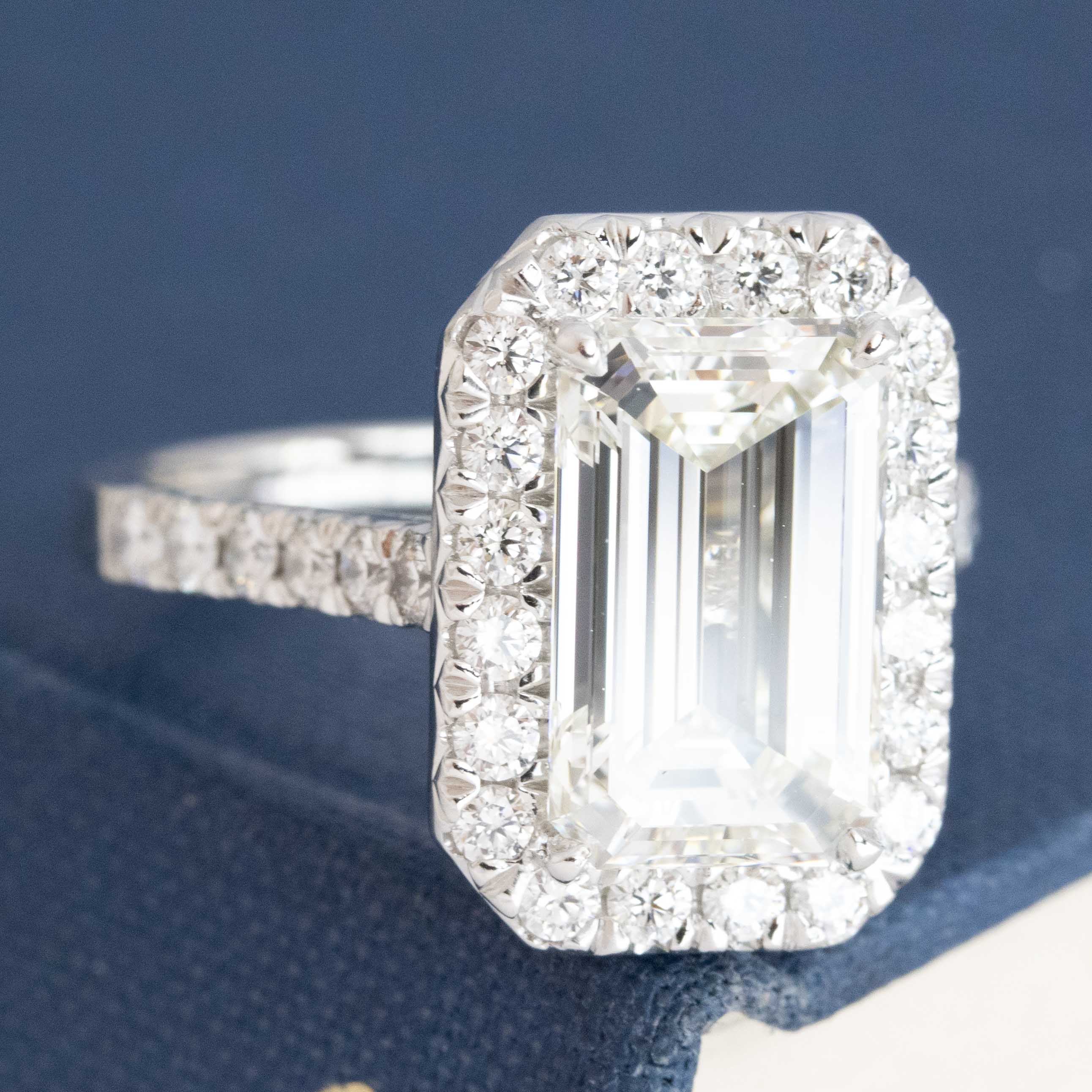 4.01CT EMERALD CUT DIAMOND HALO RING, GIA K VVS2