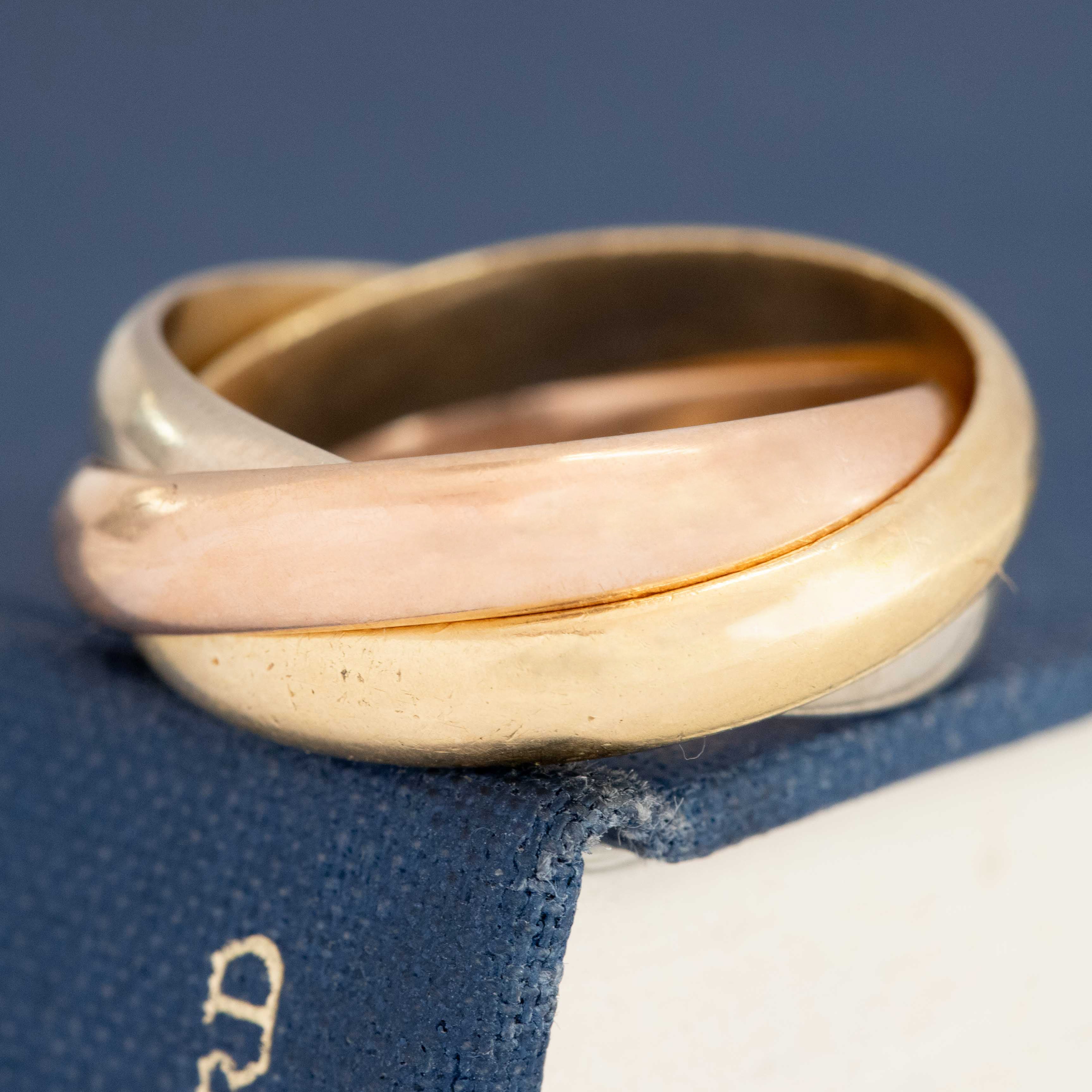 Cartier France vintage wide rolling ring in gold, classic Trinity design