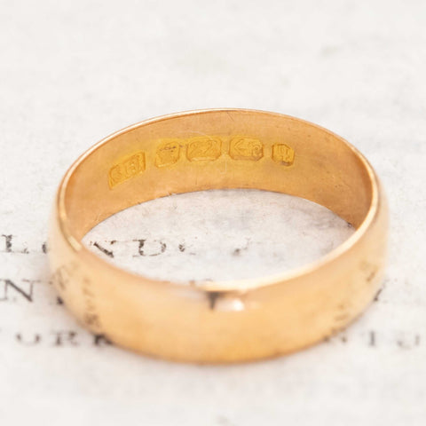 Elegant antique 22kt gold band, heirloom-quality wedding ring.