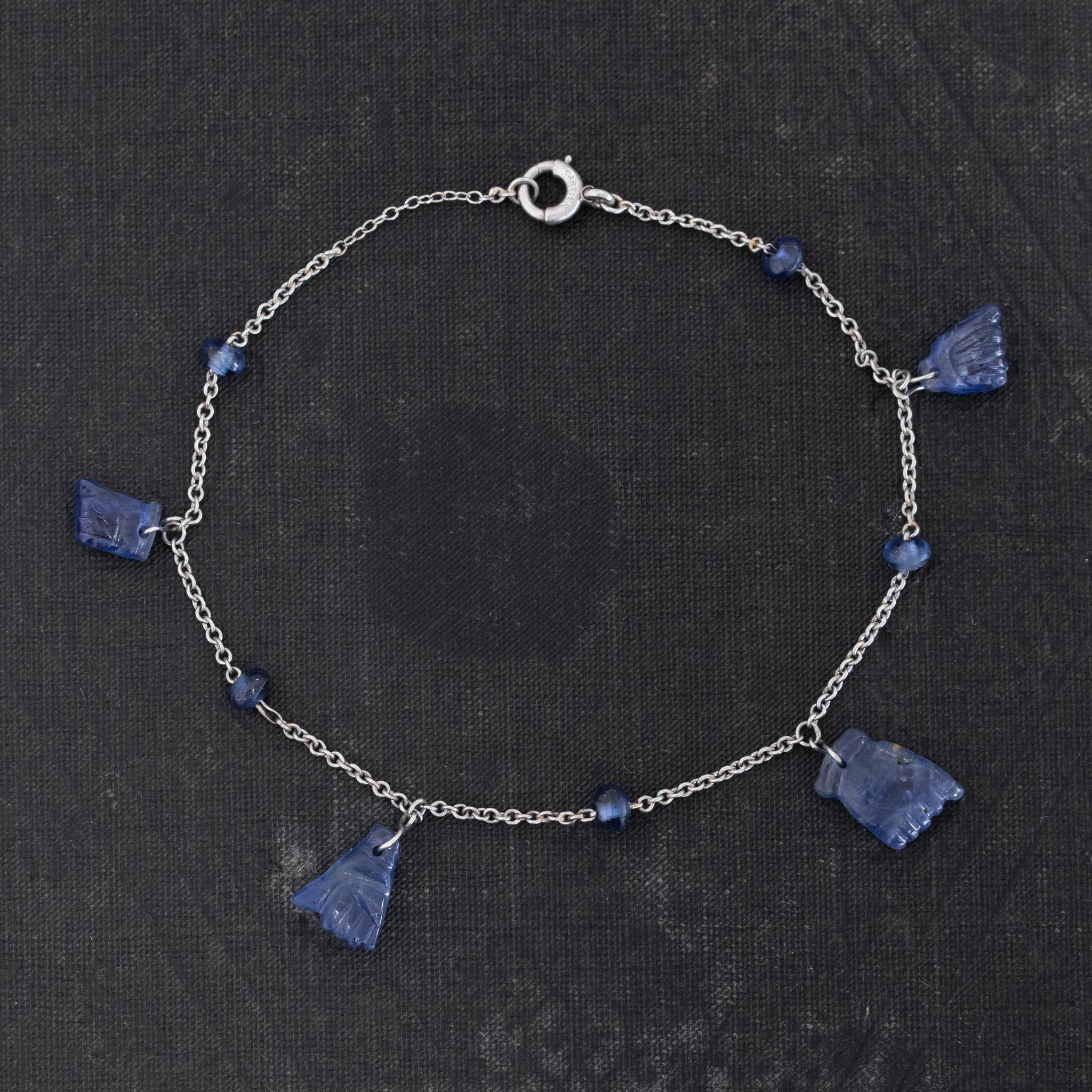 Antique Carved Sapphire Charm Bracelet, by Cartier