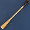 French antique gold cigar holder with engine-turned detailing and horn mouthpiece