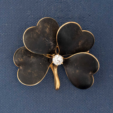 Victorian black enamel four-leaf clover brooch pendant with old mine cut diamond in 14kt yellow gold
