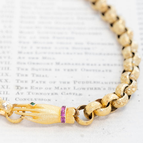 Close up of antique hand clasp on Victorian long guard chain