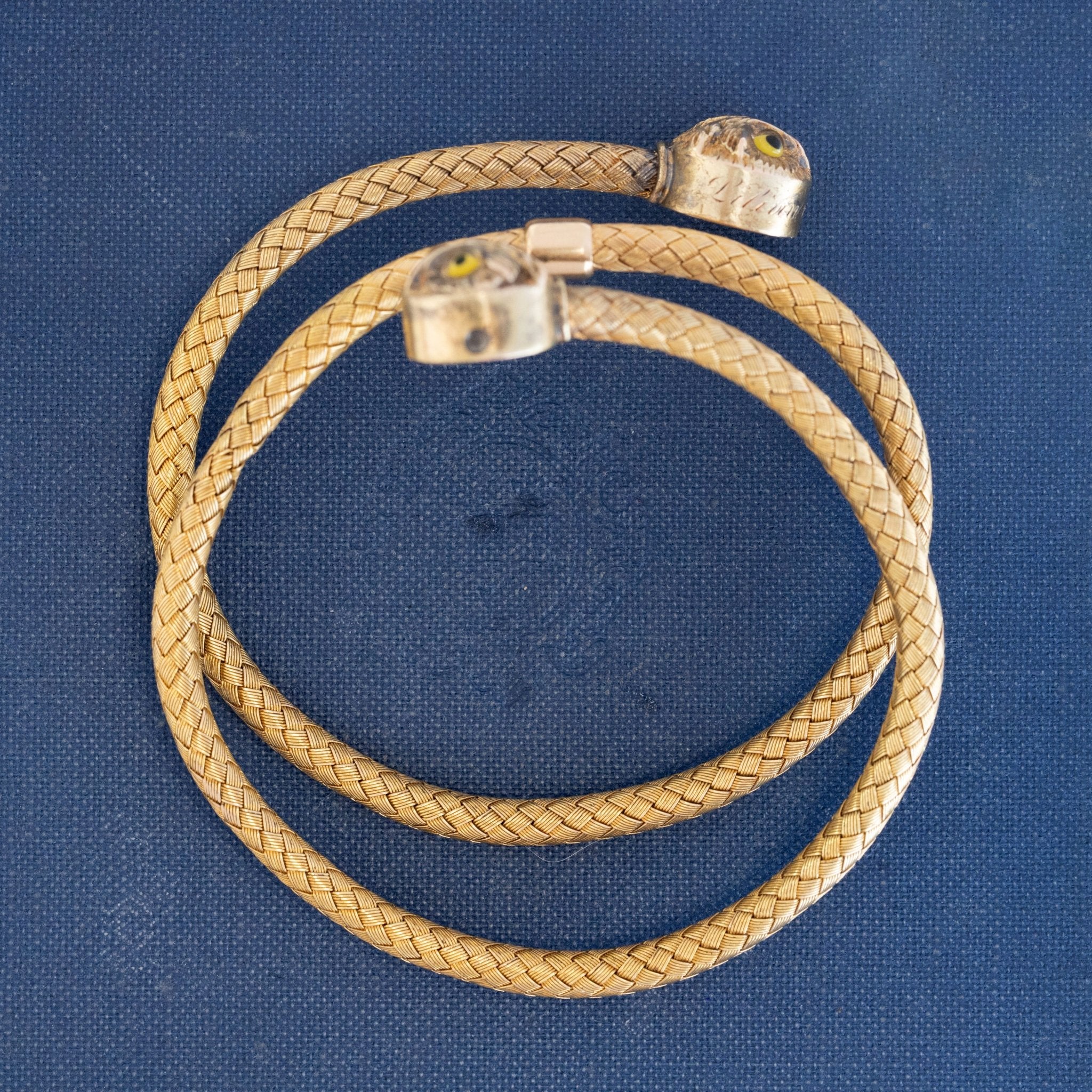 1880 antique gold owl bracelet with braided chain and yellow enamel eyes