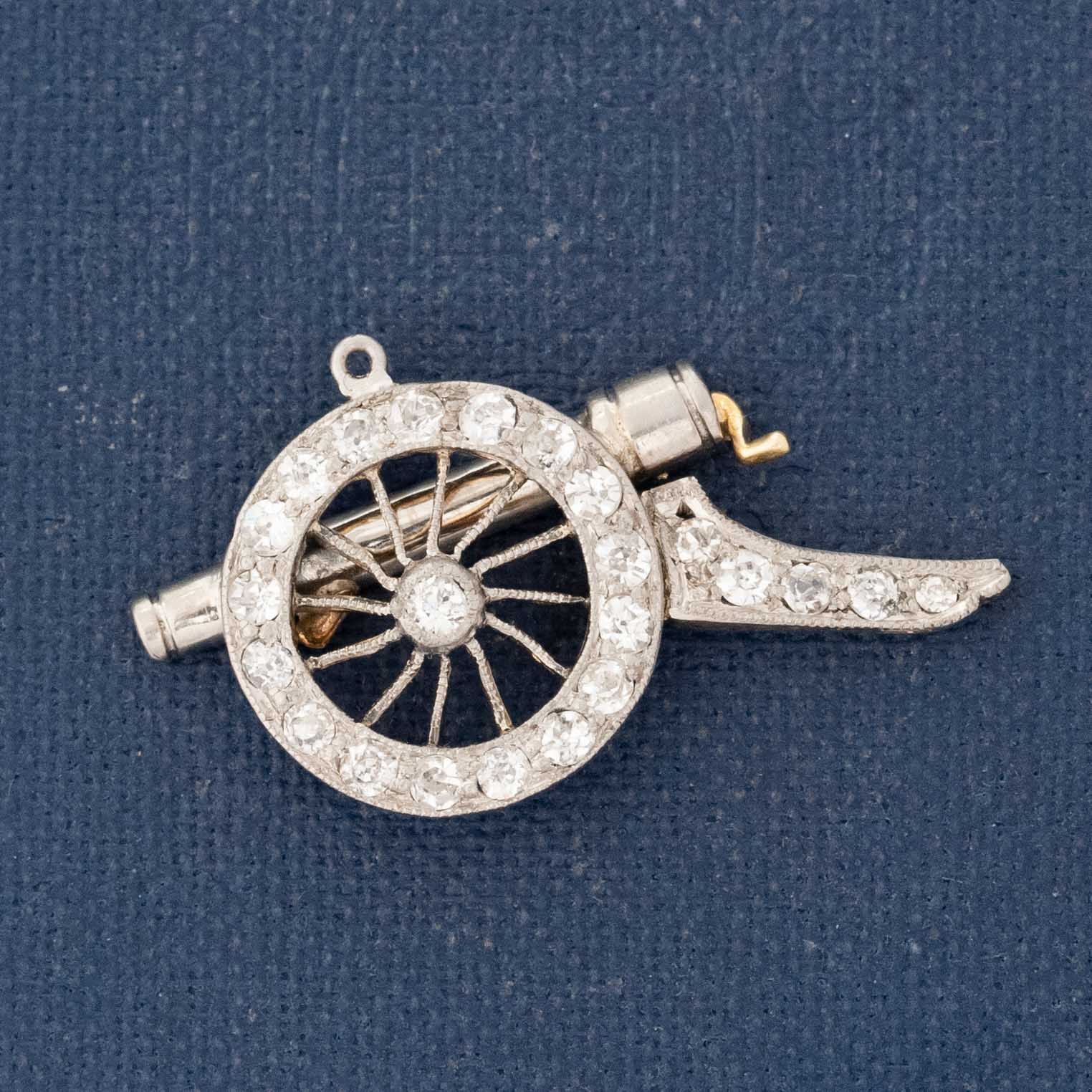 Vintage diamond cannon charm in platinum and gold