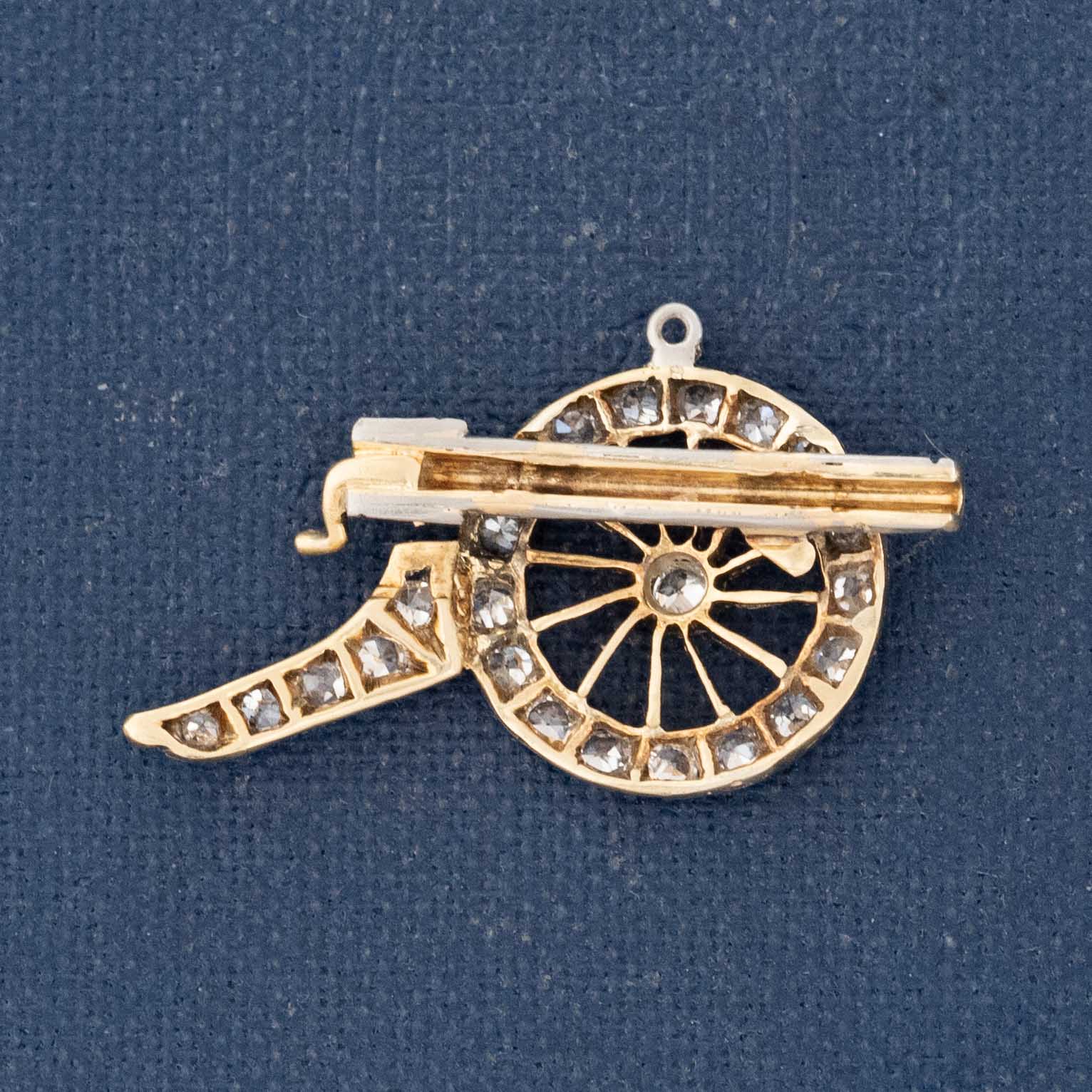 Antique cannon motif charm with pavé diamonds