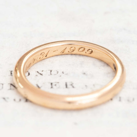 Unisex antique 18kt gold wedding band with warm glow.