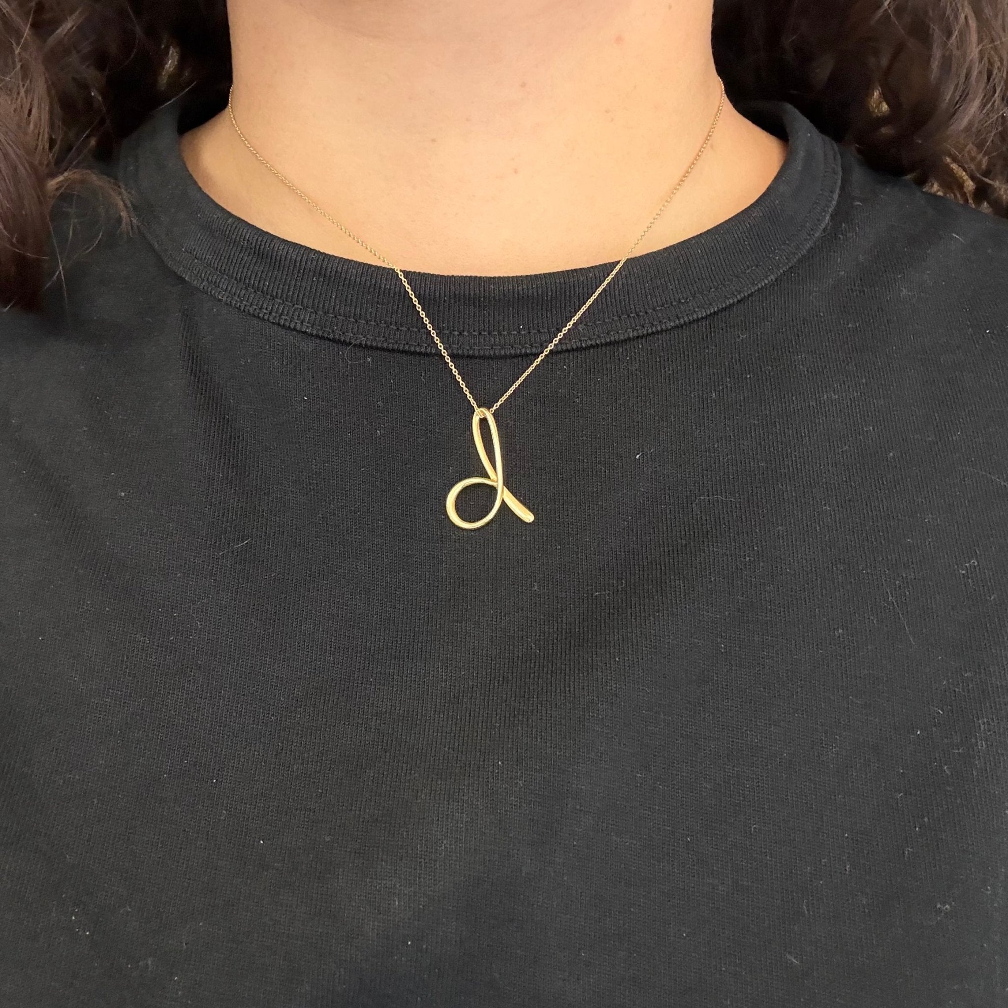 D Letter Pendant, by Elsa Peretti for Tiffany & Co.