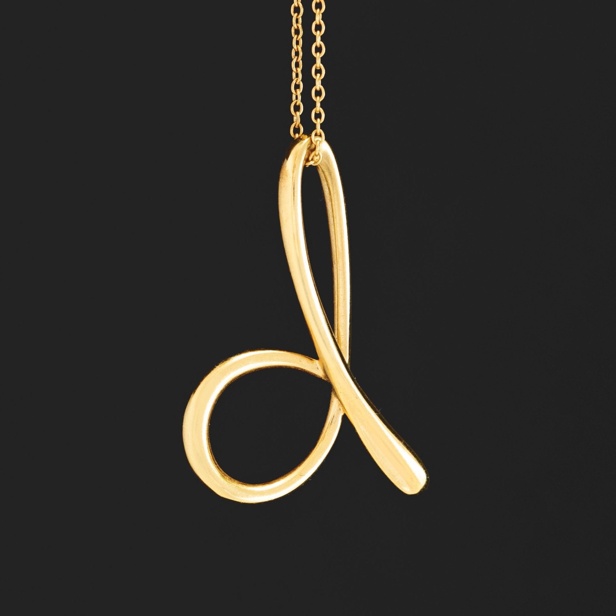 D Letter Pendant, by Elsa Peretti for Tiffany & Co.