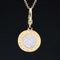 Authentic vintage Bvlgari round pendant in 18k yellow gold with pavé-set white diamonds and engraved BVLGARI logo, collectible Italian designer jewelry for luxury vintage and antique jewelry lovers from Jewels by Grace.