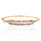 Edwardian old European cut diamond and ruby bangle bracelet, 2.03ctw, platinum and gold
