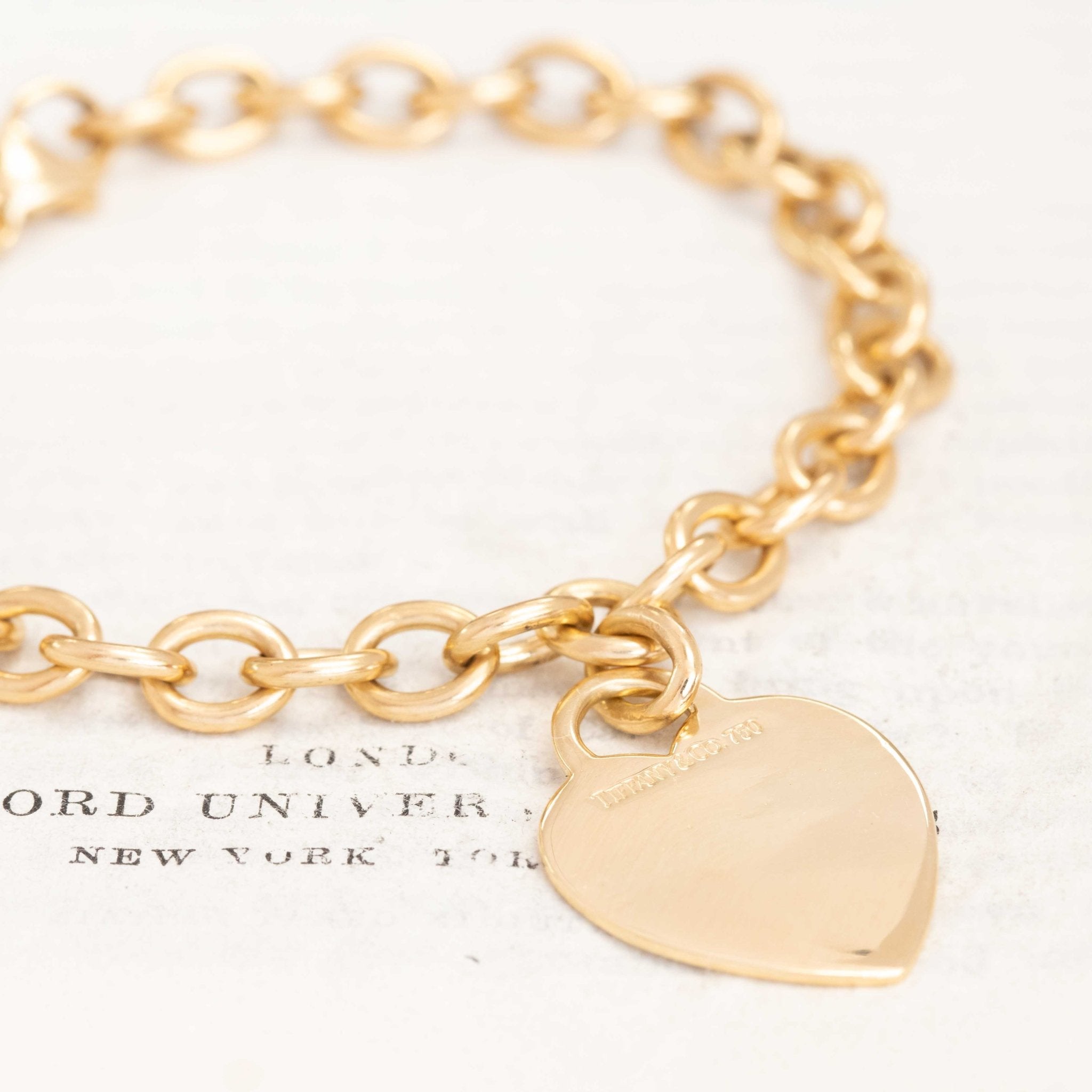 18kt yellow gold Tiffany heart tag bracelet, open cable chain style.