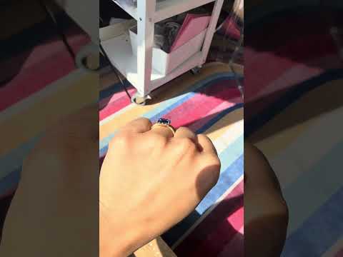 Video of the collet bezel setting vintage style sapphire engagement ring
