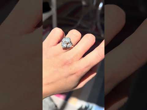Art Deco two-stone diamond ring with stepped geometric shoulders