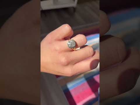 Ring on finger: Old Mine Cut 4.53 ct diamond bezel solitaire, gold vintage engagement ring