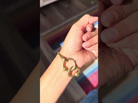 video of vintage gold bridle bit motif bracelet being worn on a wrist