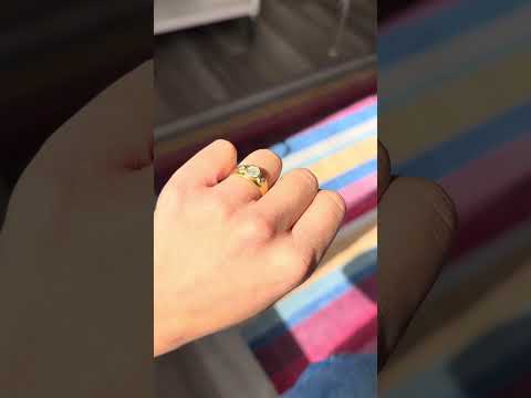 Youtube video of Ring on the finger showing the vintage three-stone diamond ring in gold