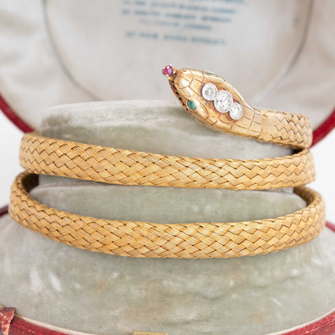 Victorian woven-gold serpent bracelet with diamond and emerald head in Tessier box