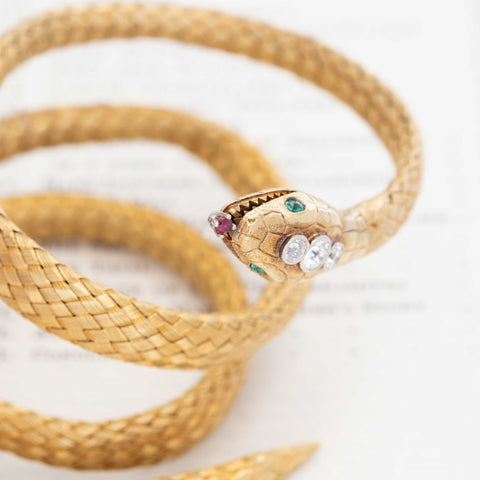 Antique Tessier London serpent bracelet displayed in original case