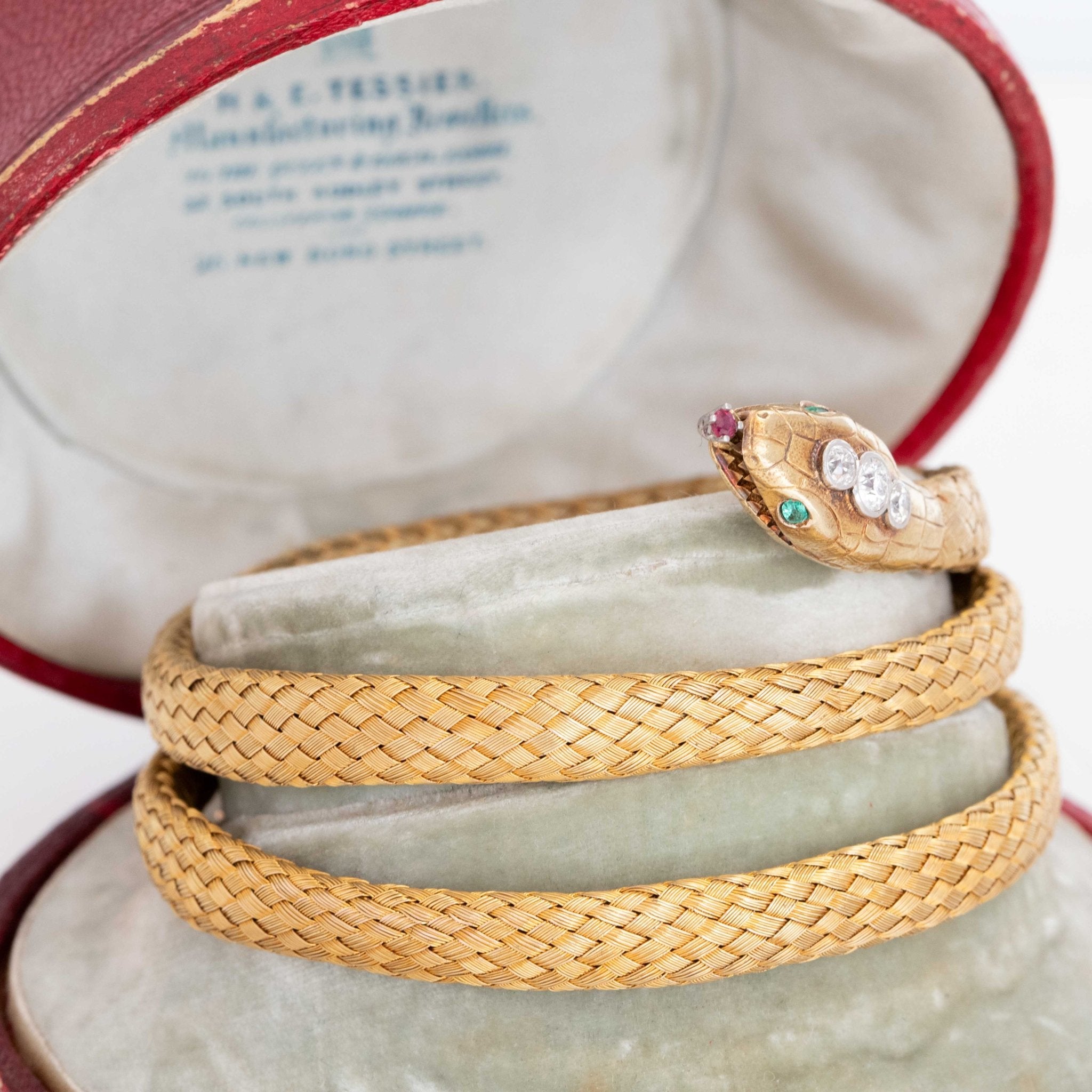 Flexible woven gold serpent bracelet wrapped in three coils