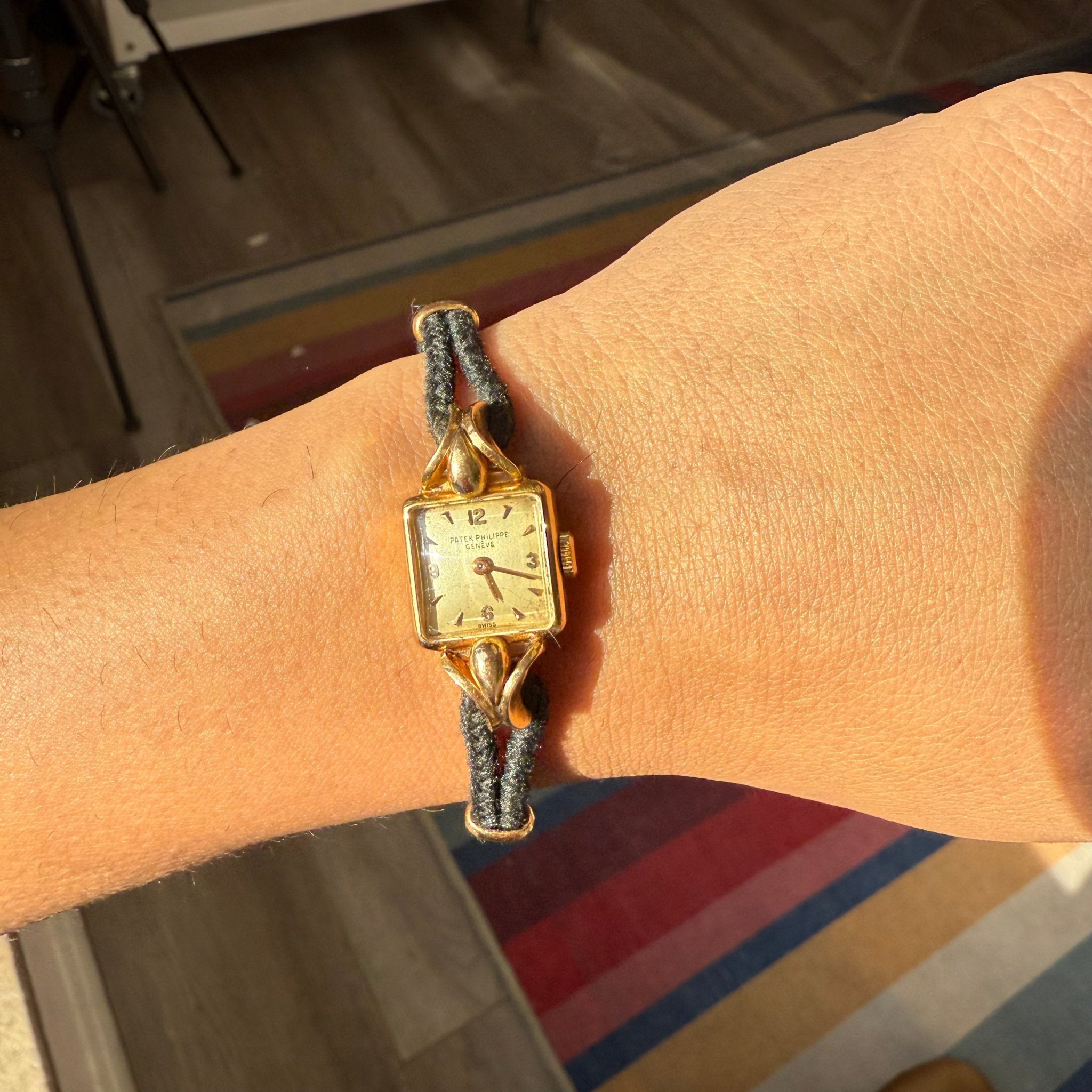 Mid-century Patek Philippe gold watch with cord strap
