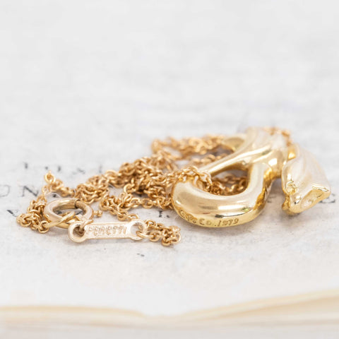 1980s Tiffany Peretti Dragon charm in 18k yellow gold