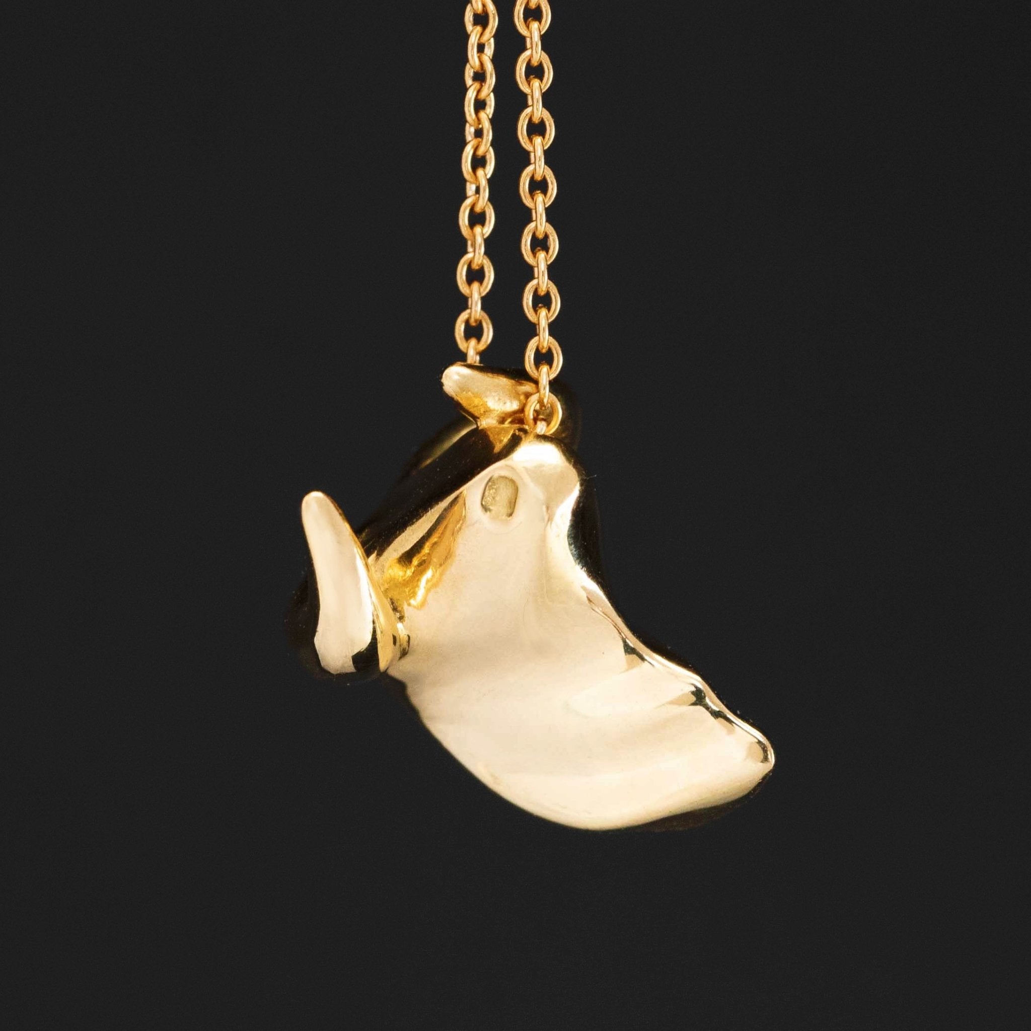 Vintage Elsa Peretti Tiffany 18k gold Ox zodiac pendant from 1980s